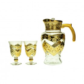 A set of a teapot and 6 gold-rimmed, faceted glasses