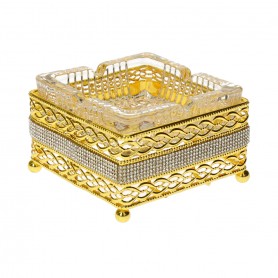 Glass cigar holder with a diamond-shaped metal base