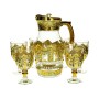 A set of a teapot and 6 gold-rimmed, faceted glasses