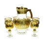 A set of a teapot and 6 gold-rimmed, faceted glasses
