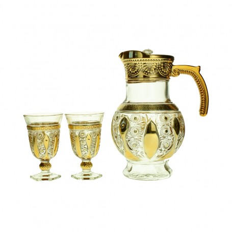 A set of a teapot and 6 gold-rimmed, faceted glasses