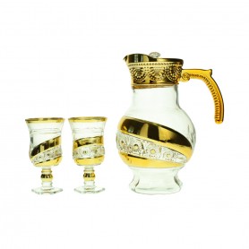 A set of a teapot and 6 gold-rimmed, faceted glasses