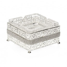 Glass cigar holder with a diamond-shaped metal base