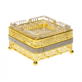 Glass cigar holder with a diamond-shaped metal base