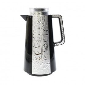 Thermos with Arabic script and a glass heart