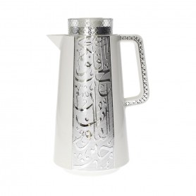 Thermos with Arabic script and a glass heart